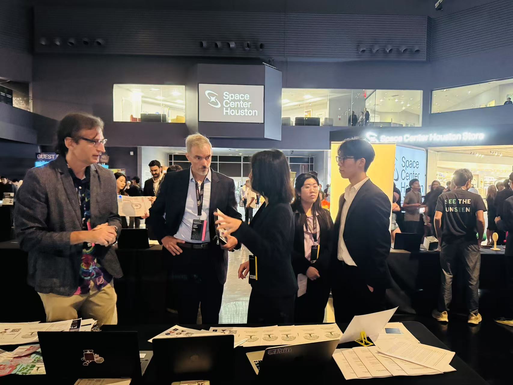 Team discussing project with judges at Space Center Houston